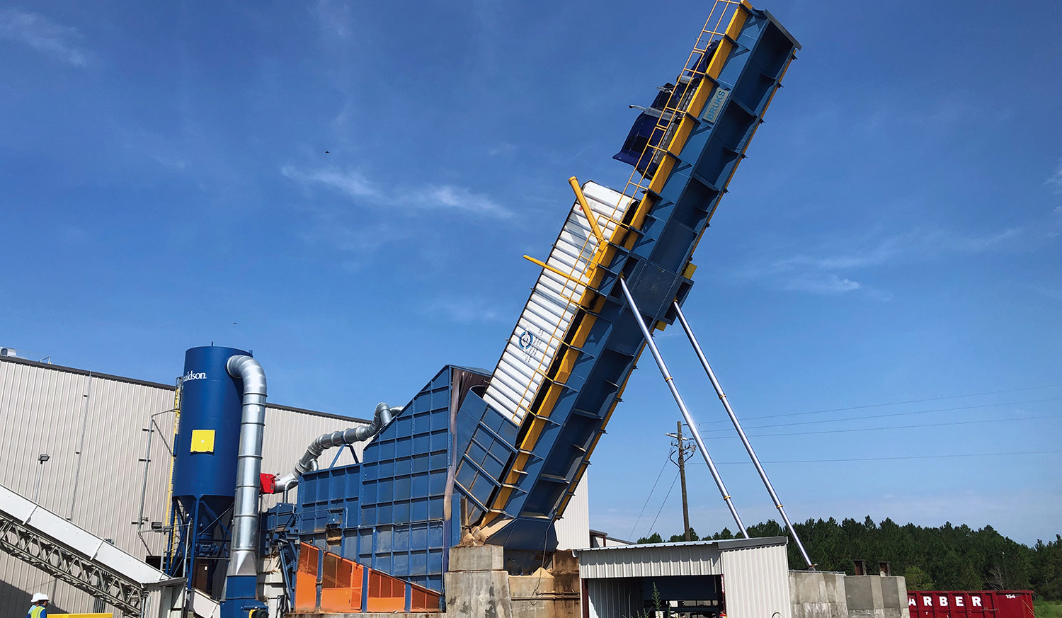 Bruks Siwertell back-in truck dump with receiving hopper and dust collector