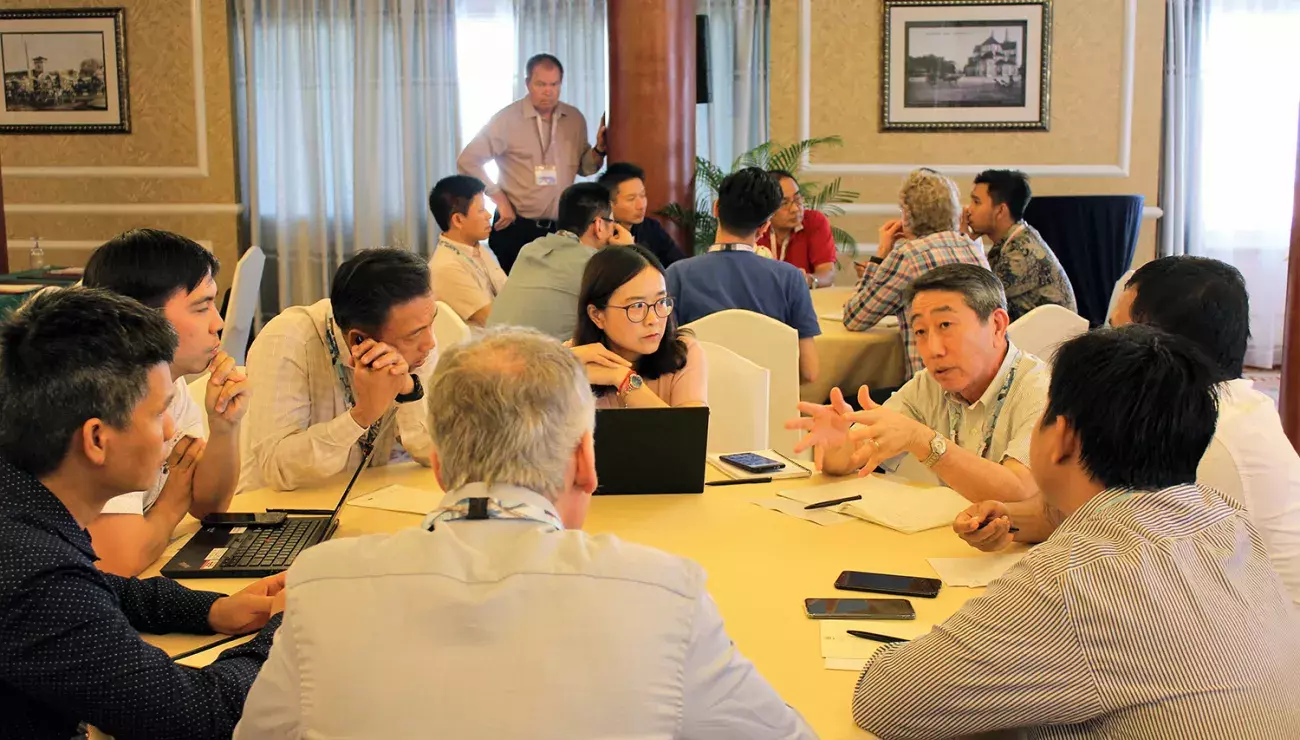 People sitting around a conference table