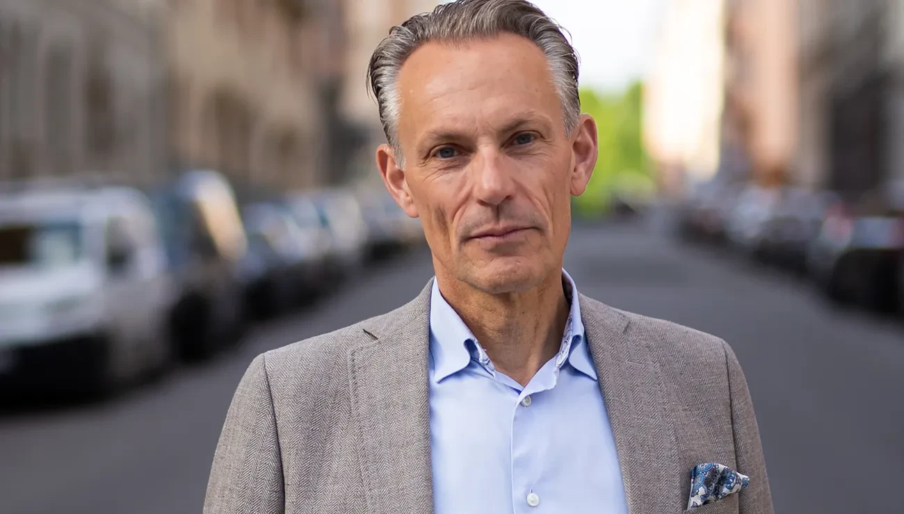 Portrait of man standing in a street