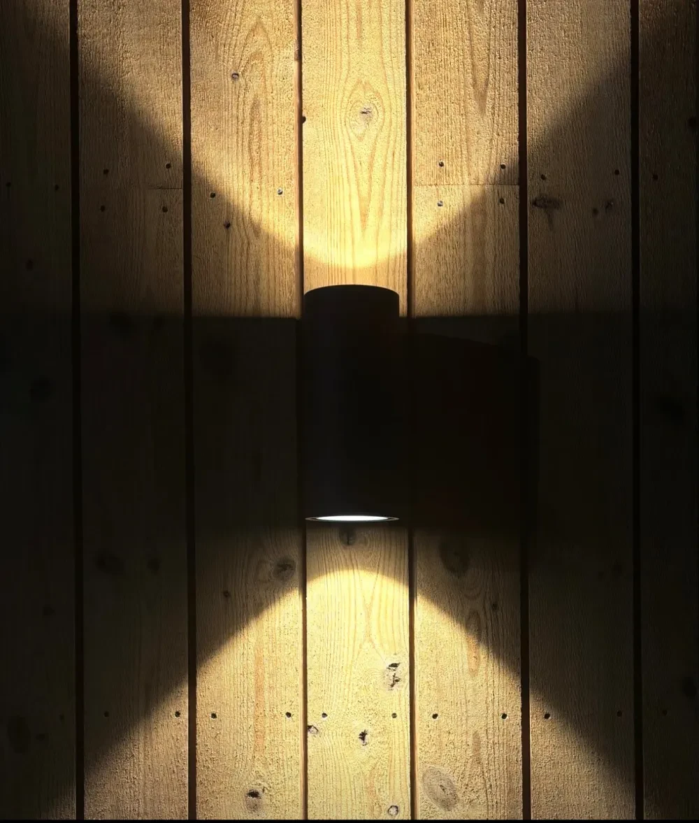 Spotlight on wooden wall