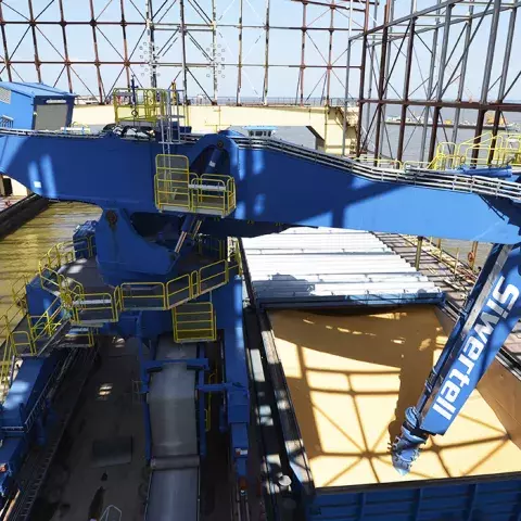 Blue Siwertell Ship unloader in operation