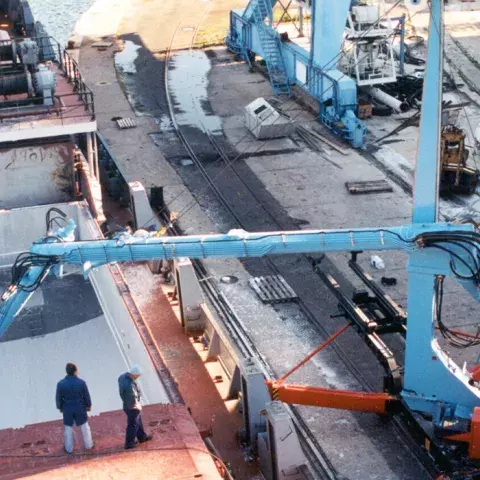 Blue Siwertell Mobile ship unloader in operation