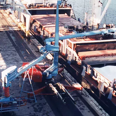 Blue Siwertell Mobile ship unloader in operation