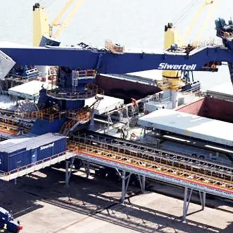 Blue Siwertell Ship unloader in operation