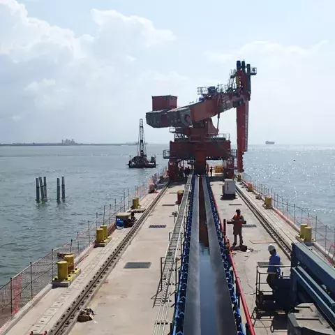 Orange Siwertell Ship unloader for grain, Brazil