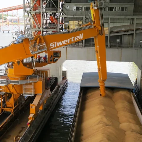 Orange Siwertell Ship unloader in operation