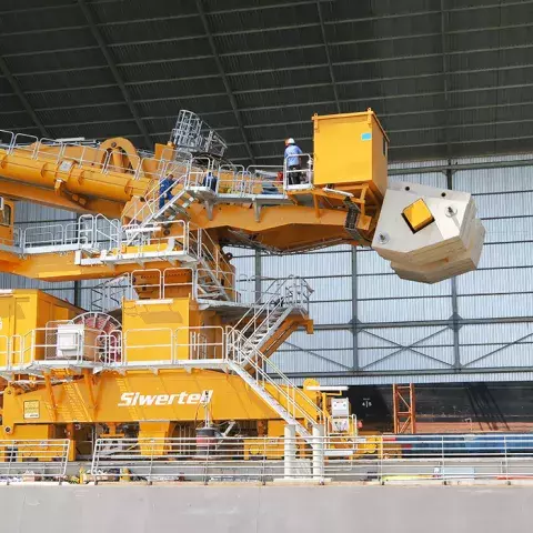 Orange Siwertell Ship unloader for grain, Brazil