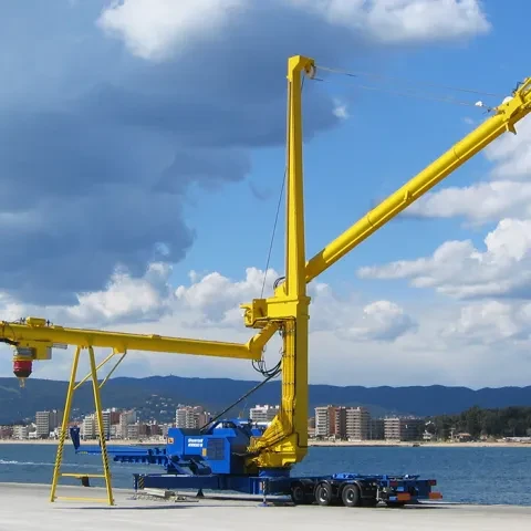 Yellow Siwertell mobile unloader by the harbor