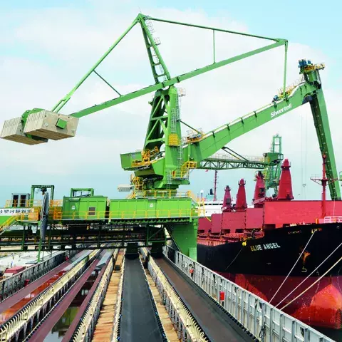 Green Siwertell Ship unloader in operation