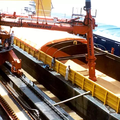 Orange Siwertell ship unloader in operation