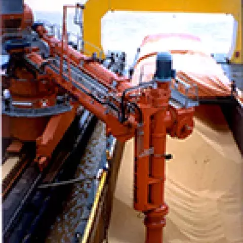 Orange Siwertell ship unloader in operation
