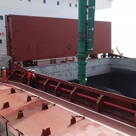 Green Siwertell Ship unloader in operation