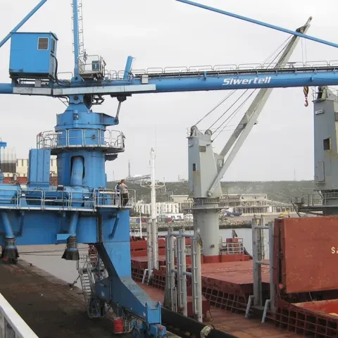Blue Siwertell Ship unloader in operation