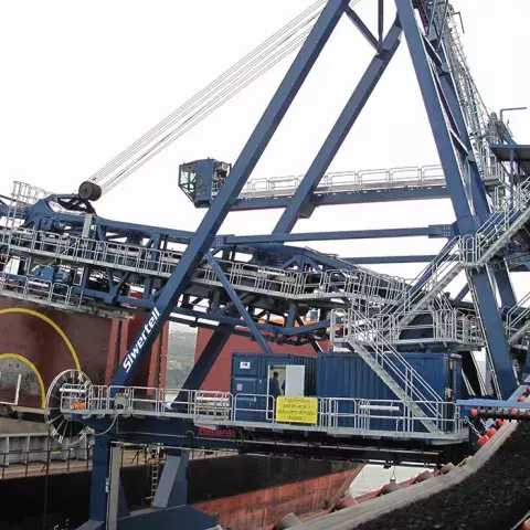 Blue Siwertell ship loader in operation