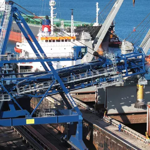 Blue Siwertell ship loader in operation