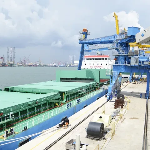 Blue Siwertell Ship unloader in operation