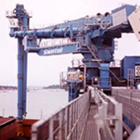 Blue Siwertell Ship unloader in operation