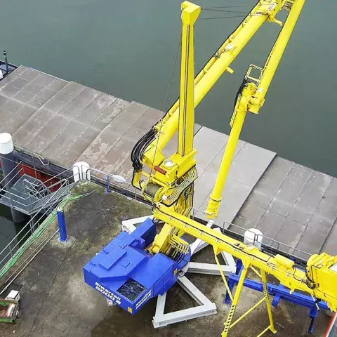 Yellow Siwertell mobile unloader in operation