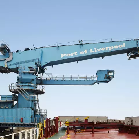 Blue Siwertell Ship unloader in operation