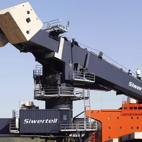 Blue Siwertell Ship unloader in operation