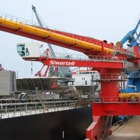 Red Siwertell Ship unloader in operation