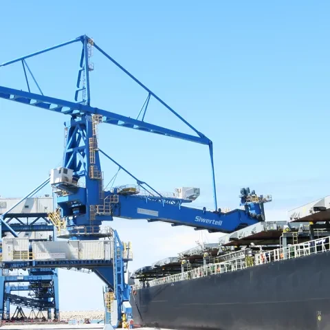 Blue Siwertell Ship unloader in operation