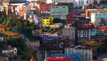 Houses in different bright colours on hill in Valparaiso