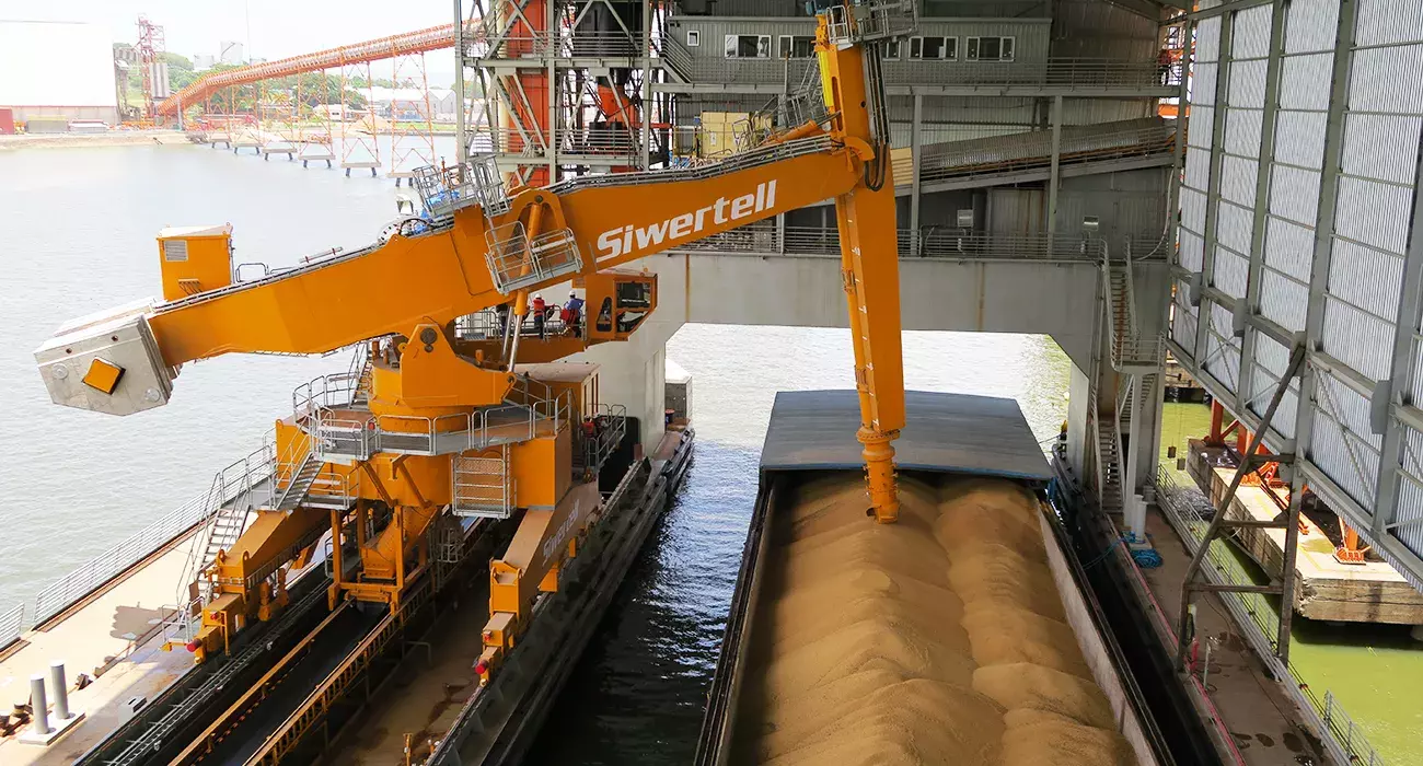 Orange Siwertell Ship unloader in operation