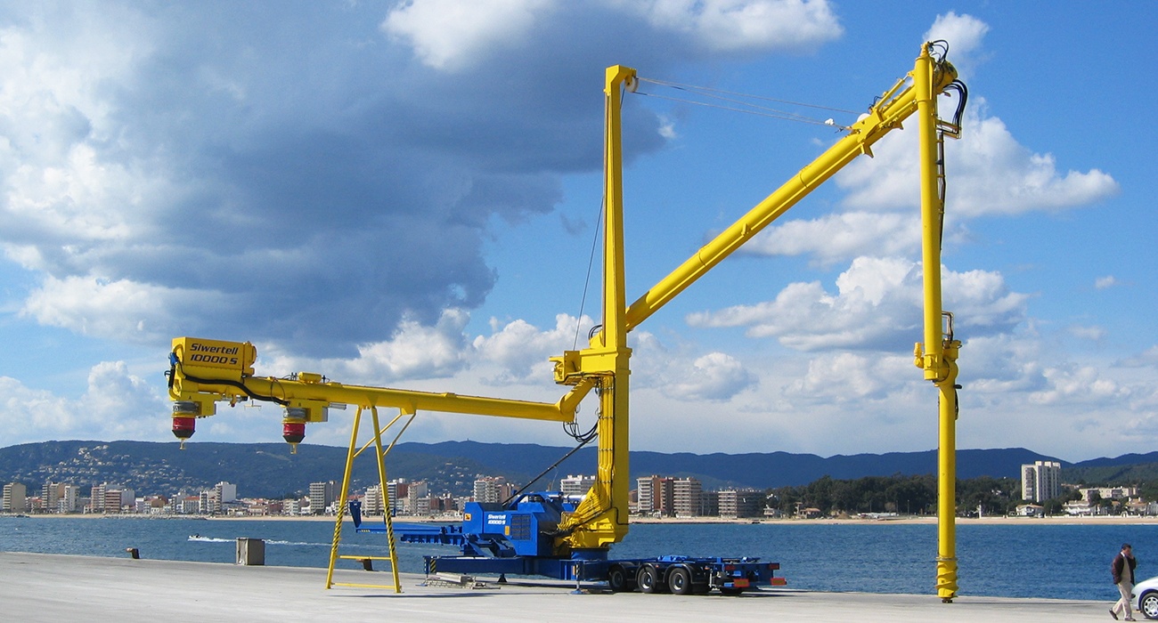 Yellow Siwertell mobile unloader by the harbor